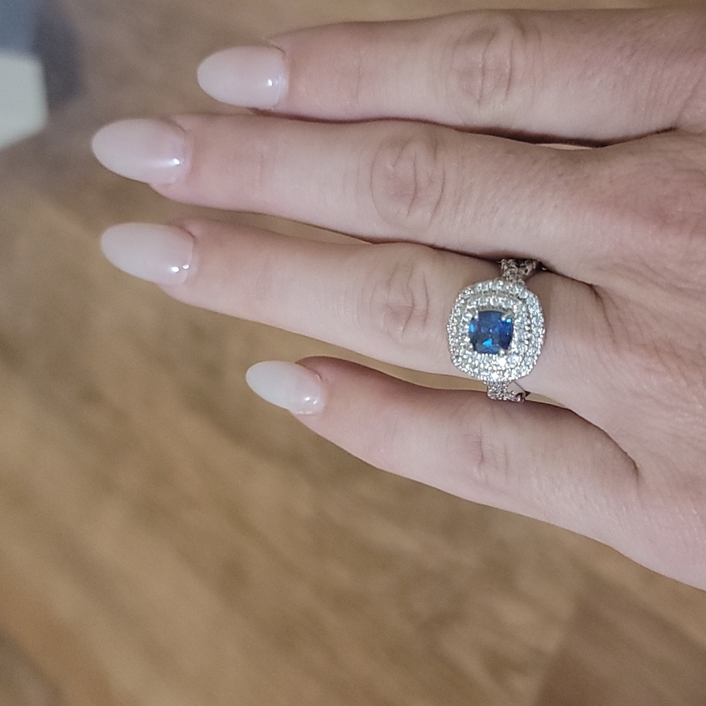 Blue sapphire and white topaz ring